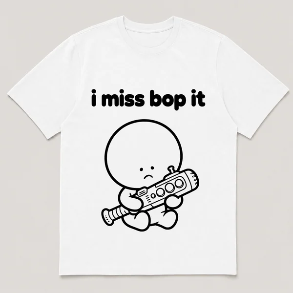 lonely boi tee: a small sad cartoon boy hugging a chunky plastic game baton with buttons, with the words i miss bop it above him