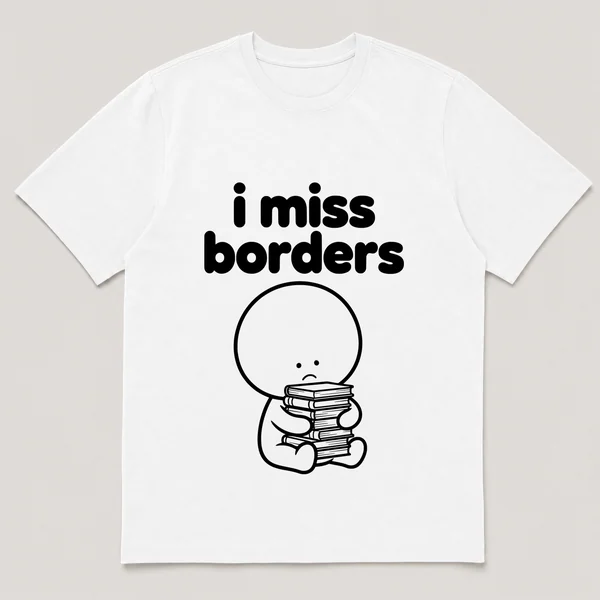 lonely boi tee: a small sad cartoon boy hugging a tall stack of paperback books, with the words i miss borders above him