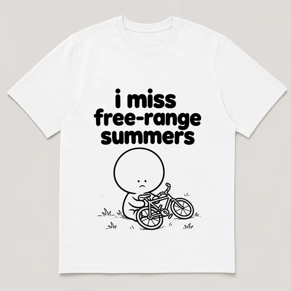 lonely boi tee: a small sad cartoon boy hugging a bike dropped sideways on the grass, with the words i miss free-range summers above him