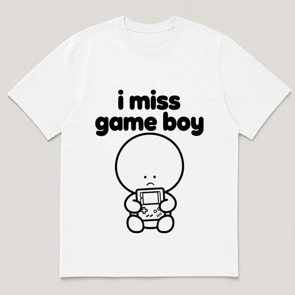 lonely boi tee: a small sad cartoon boy hugging a chunky handheld game console, with the words i miss game boy above him