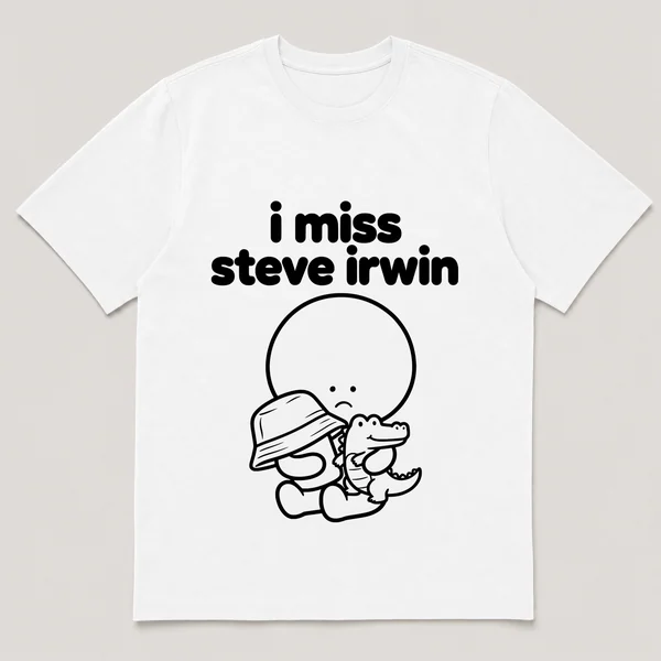 lonely boi tee: a small sad cartoon boy hugging a khaki hat and a small crocodile, with the words i miss steve irwin above him